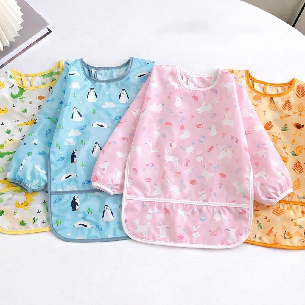 Bavoir imperméable manches longues – motif cartoon